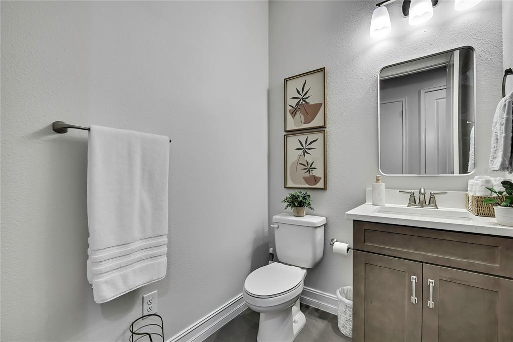 6098 North Peardale Terrace Beverly Hills, FL 34465 - Photo 32 of 59 a bathroom with a toilet a sink and mirror