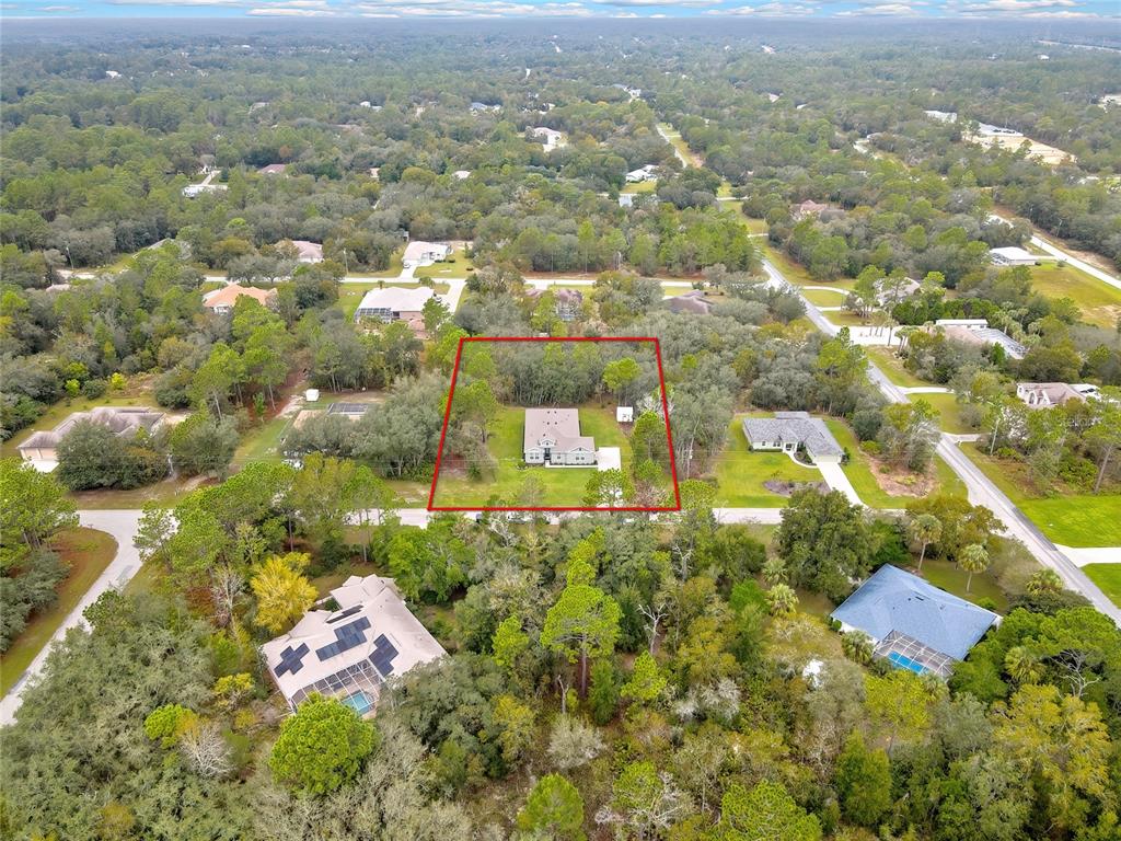 6098 North Peardale Terrace Beverly Hills, FL 34465 - Photo 57 of 59 an aerial view of residential houses with outdoor space