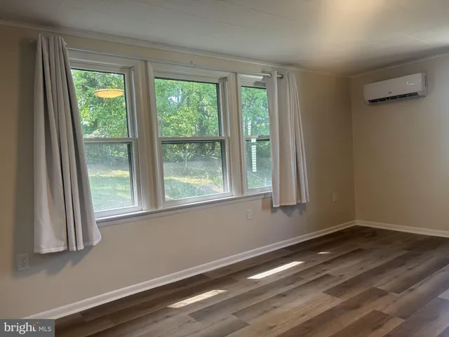 a view of a livingroom with a window