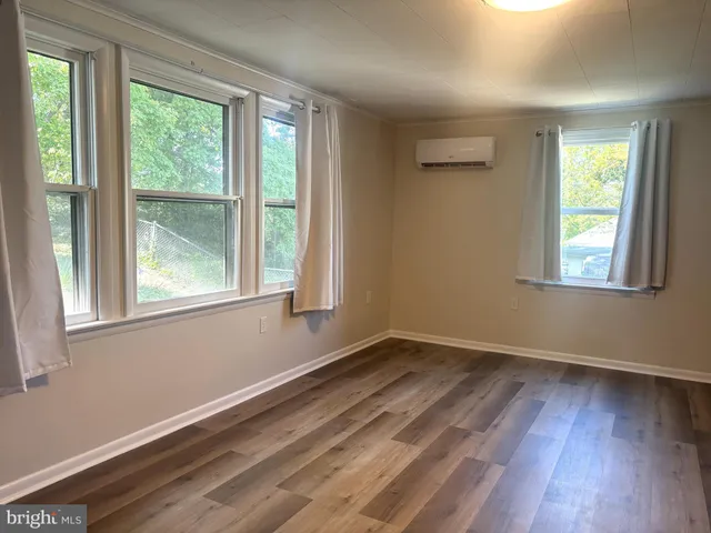 a view of a kitchen from the hallway