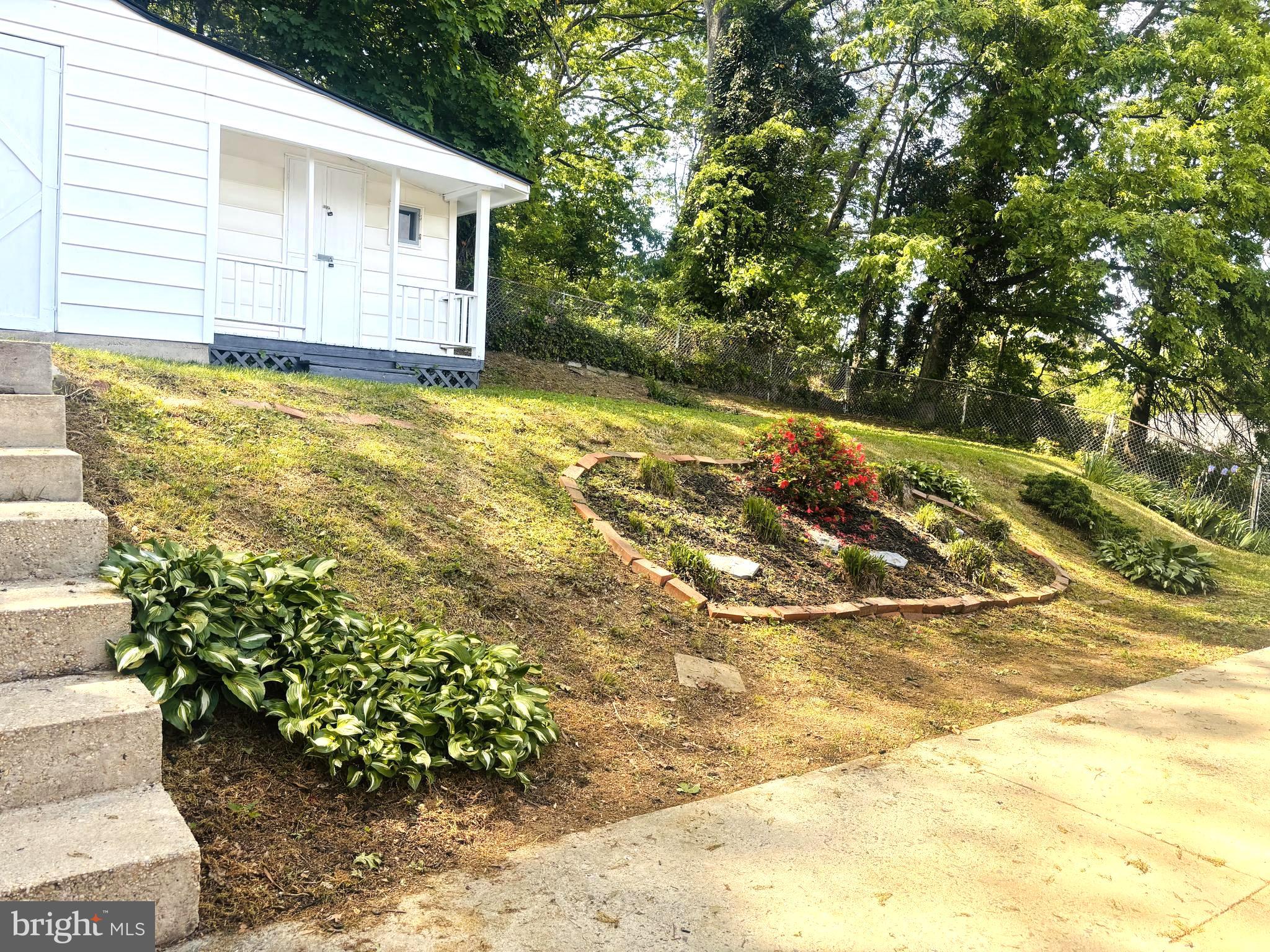 4714 Glenoak Road Hyattsville, MD 20784 - Photo 38 of 41 a view of a house with a yard