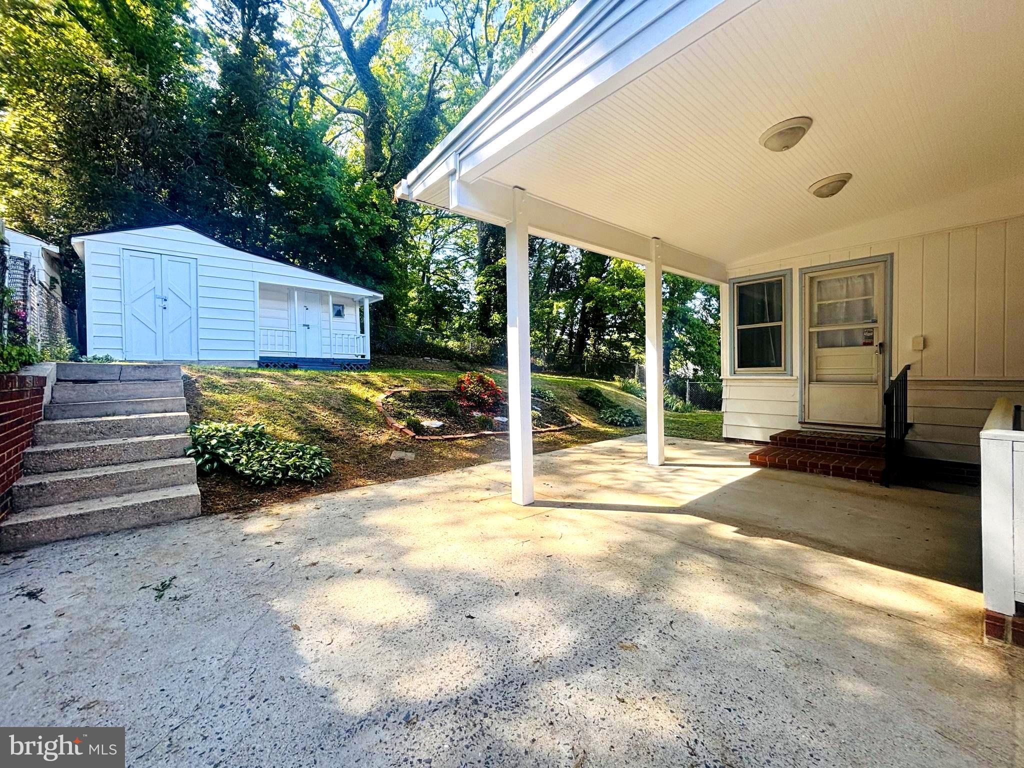 4714 Glenoak Road Hyattsville, MD 20784 - Photo 39 of 41 a view of a house with backyard and a patio