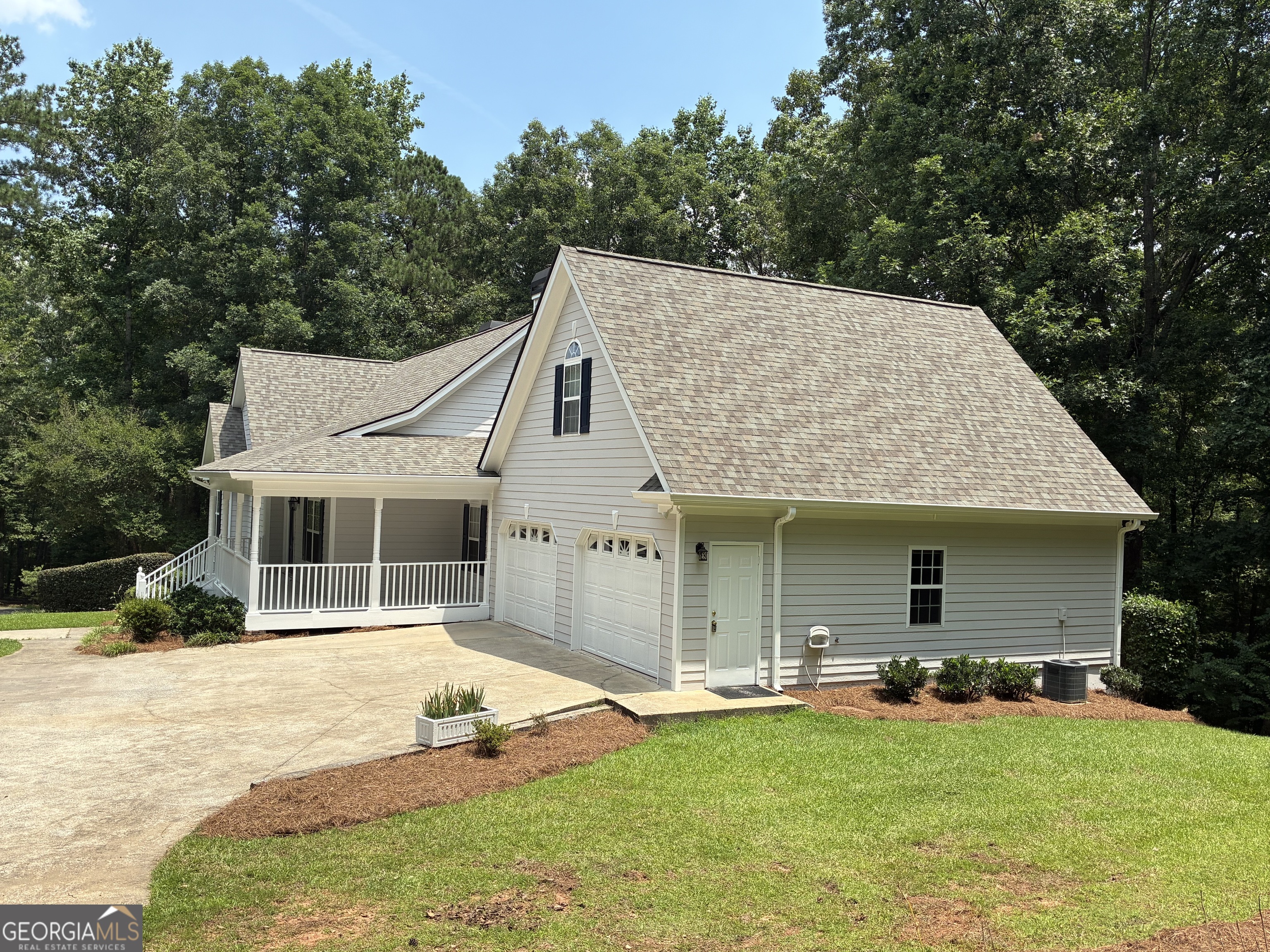 4580 Liberty Road Villa Rica, GA 30180 - Photo 2 of 67 front porch and bays 1 and 2 of garage