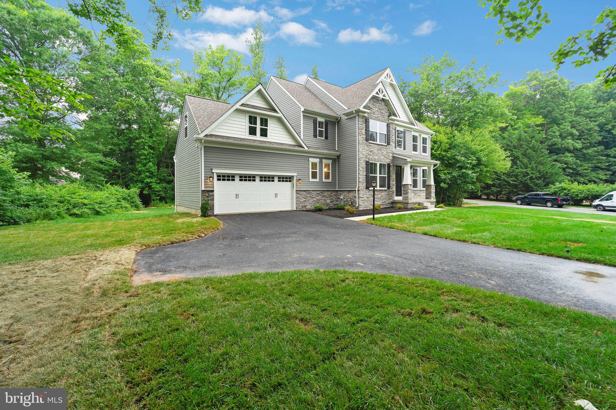 2229 A Ady Road Forest Hill, MD 21050 - Photo 2 of 75 a front view of a house with a yard and garage