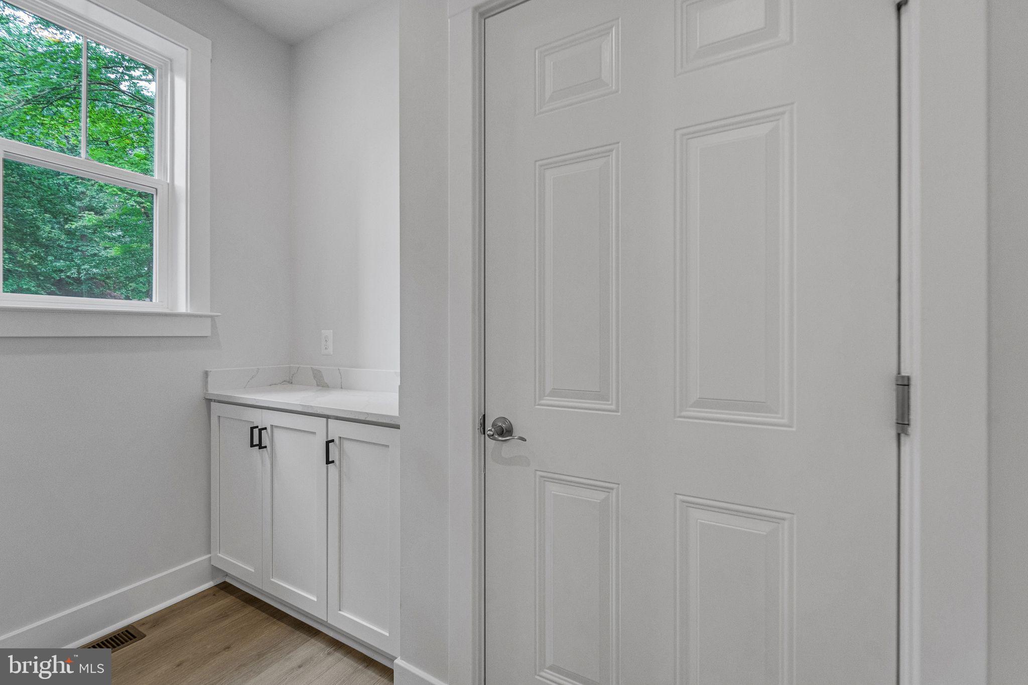 2229 A Ady Road Forest Hill, MD 21050 - Photo 26 of 75 a view of a closet area with hardwood floor