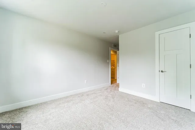 a view of a yard with a lake view