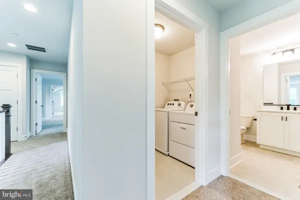 an aerial view of a house with yard