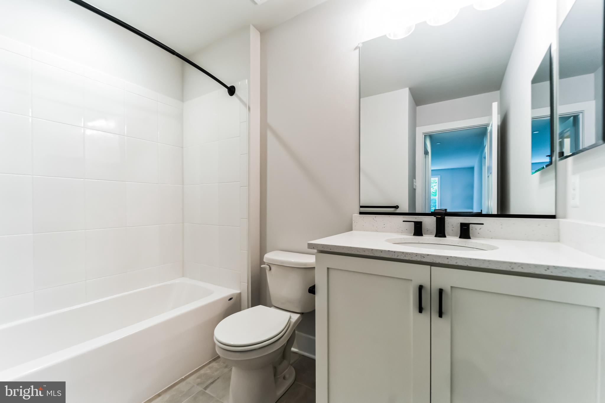 2229 A Ady Road Forest Hill, MD 21050 - Photo 47 of 75 a bathroom with a sink a toilet and shower