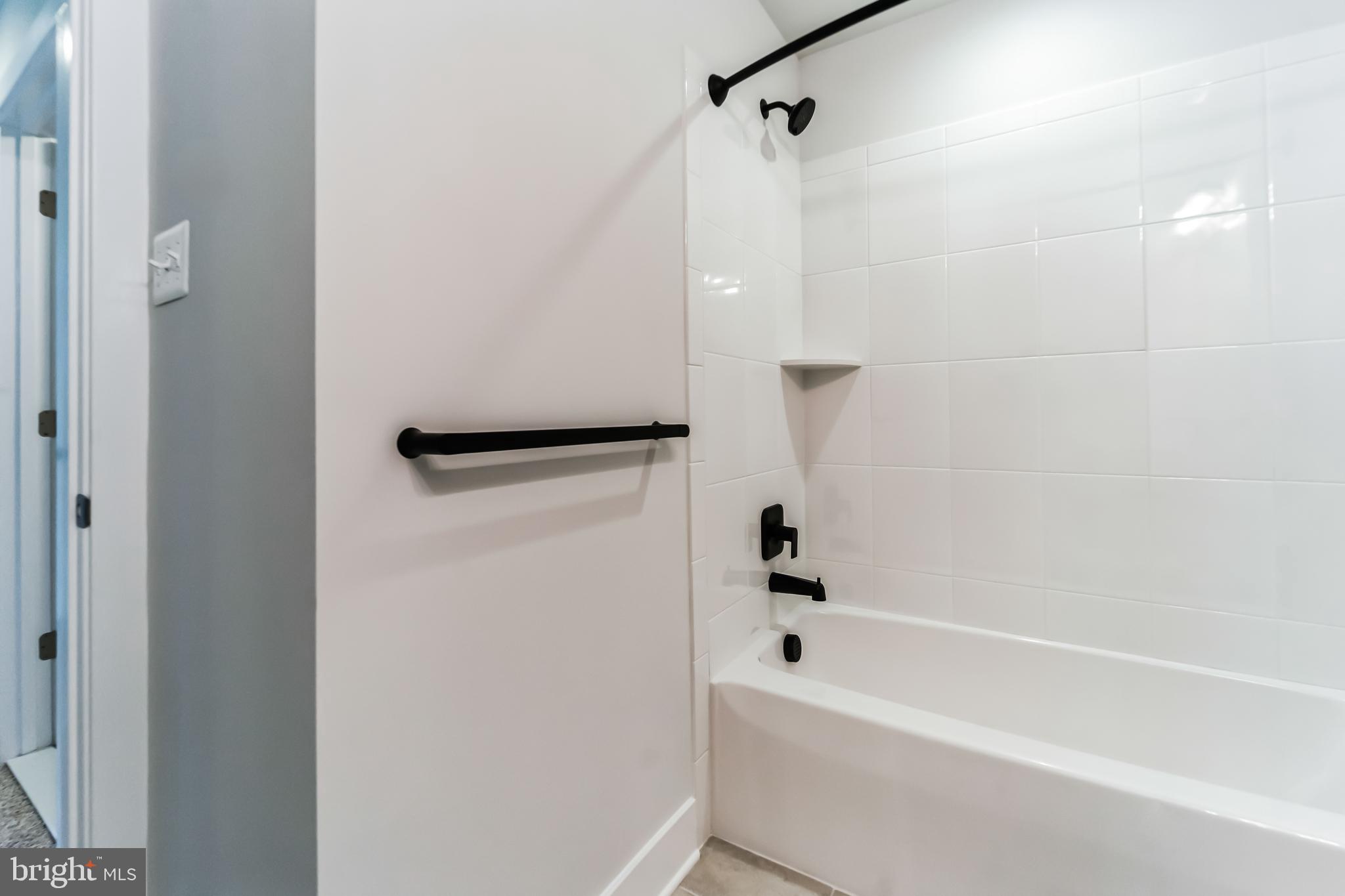 2229 A Ady Road Forest Hill, MD 21050 - Photo 49 of 75 a bathroom with a bathtub and a shower