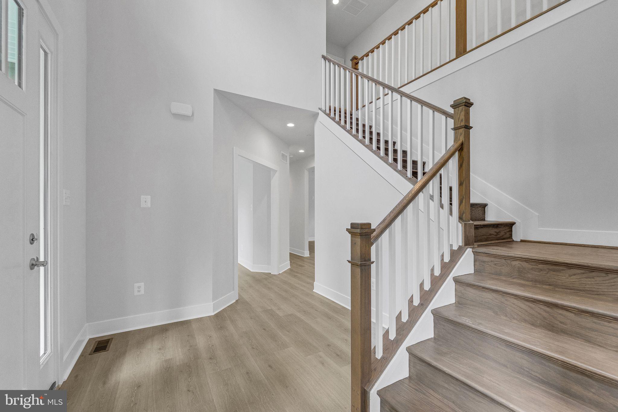 2229 A Ady Road Forest Hill, MD 21050 - Photo 7 of 75 a view of staircase with wooden floor and white walls