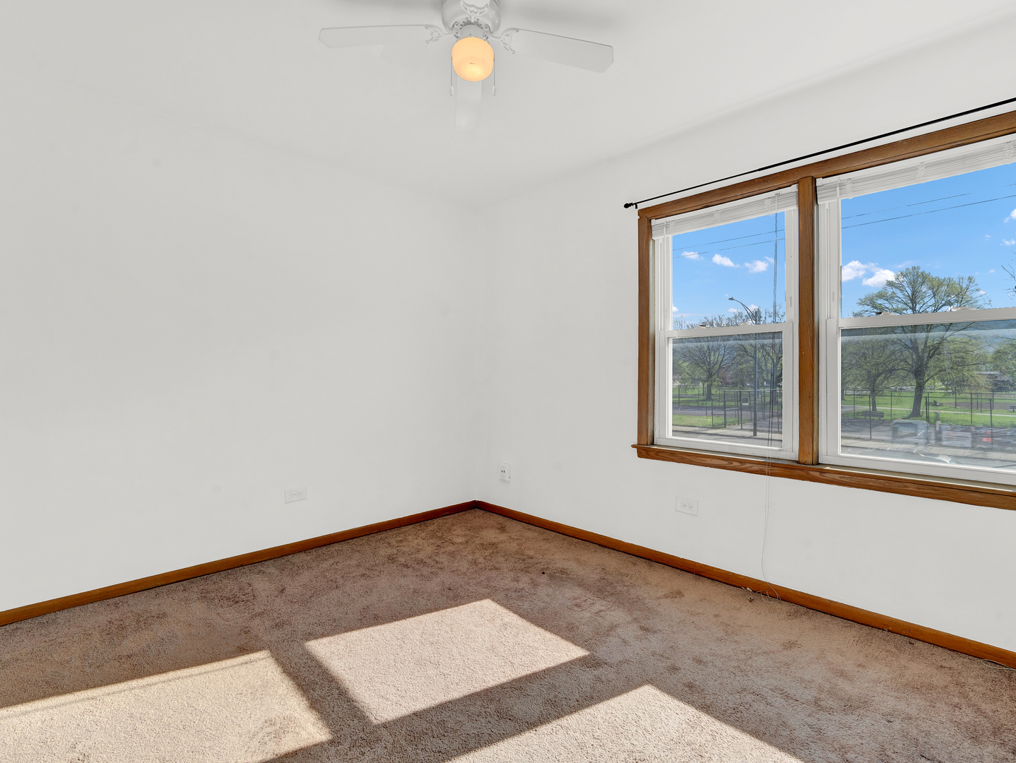 8000 South Pulaski Road, Unit 201 Chicago, IL 60652 - Photo 16 of 17 an empty room with a window