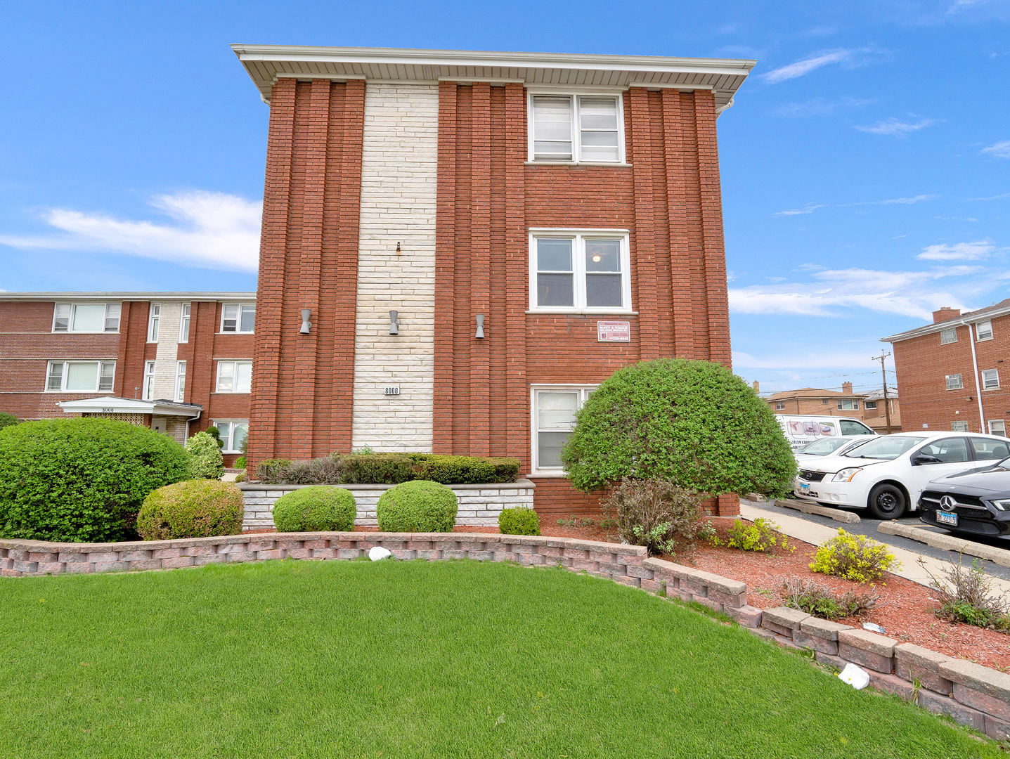 8000 South Pulaski Road, Unit 201 Chicago, IL 60652 - Photo 2 of 17 a view of a house with backyard and porch