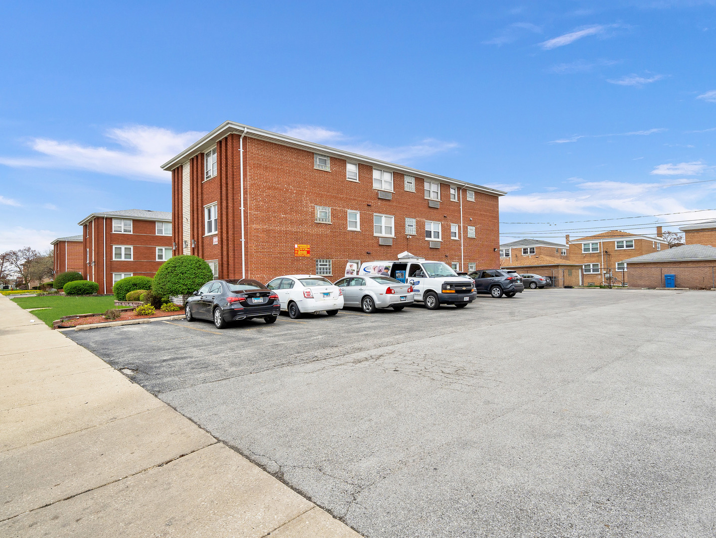 8000 South Pulaski Road, Unit 201 Chicago, IL 60652 - Photo 3 of 17 a car parked on the side of street