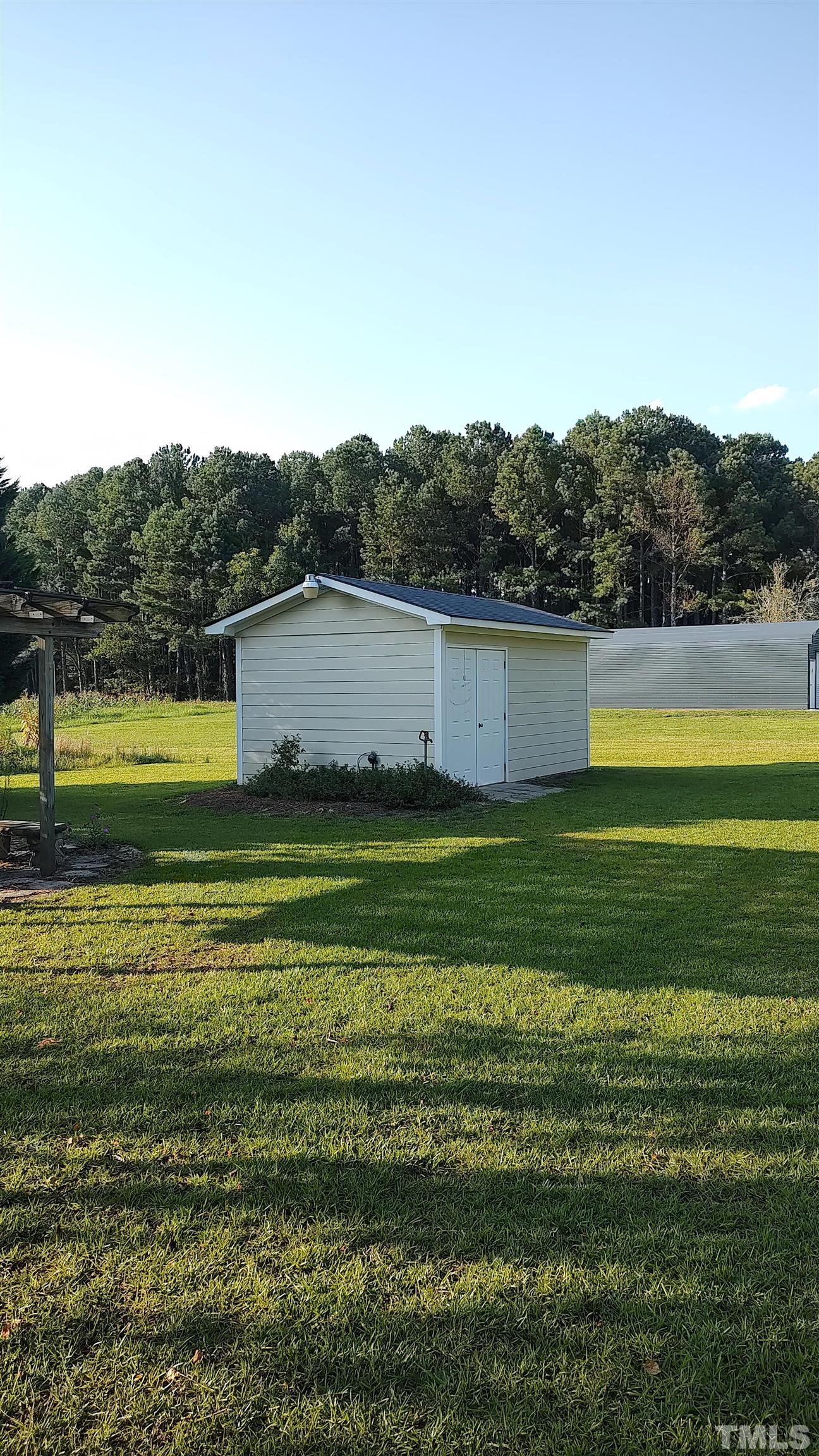 5445 Red Hill Church Road Coats, NC 27521 - Photo 60 of 66 Has Concrete Floors and is Stick Built