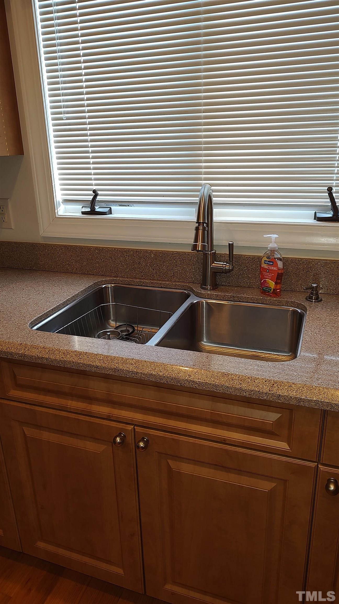 5445 Red Hill Church Road Coats, NC 27521 - Photo 10 of 66 Kitchen has nice double deep sinks and a garbage disposal.