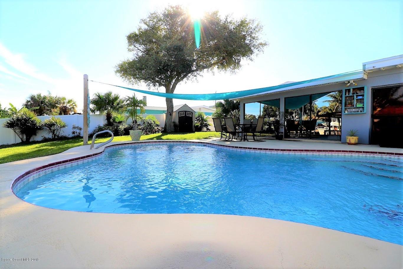 117 Chipola Road Cocoa Beach, FL 32931 - Photo 30 of 54 117 Chipola pool and yard2