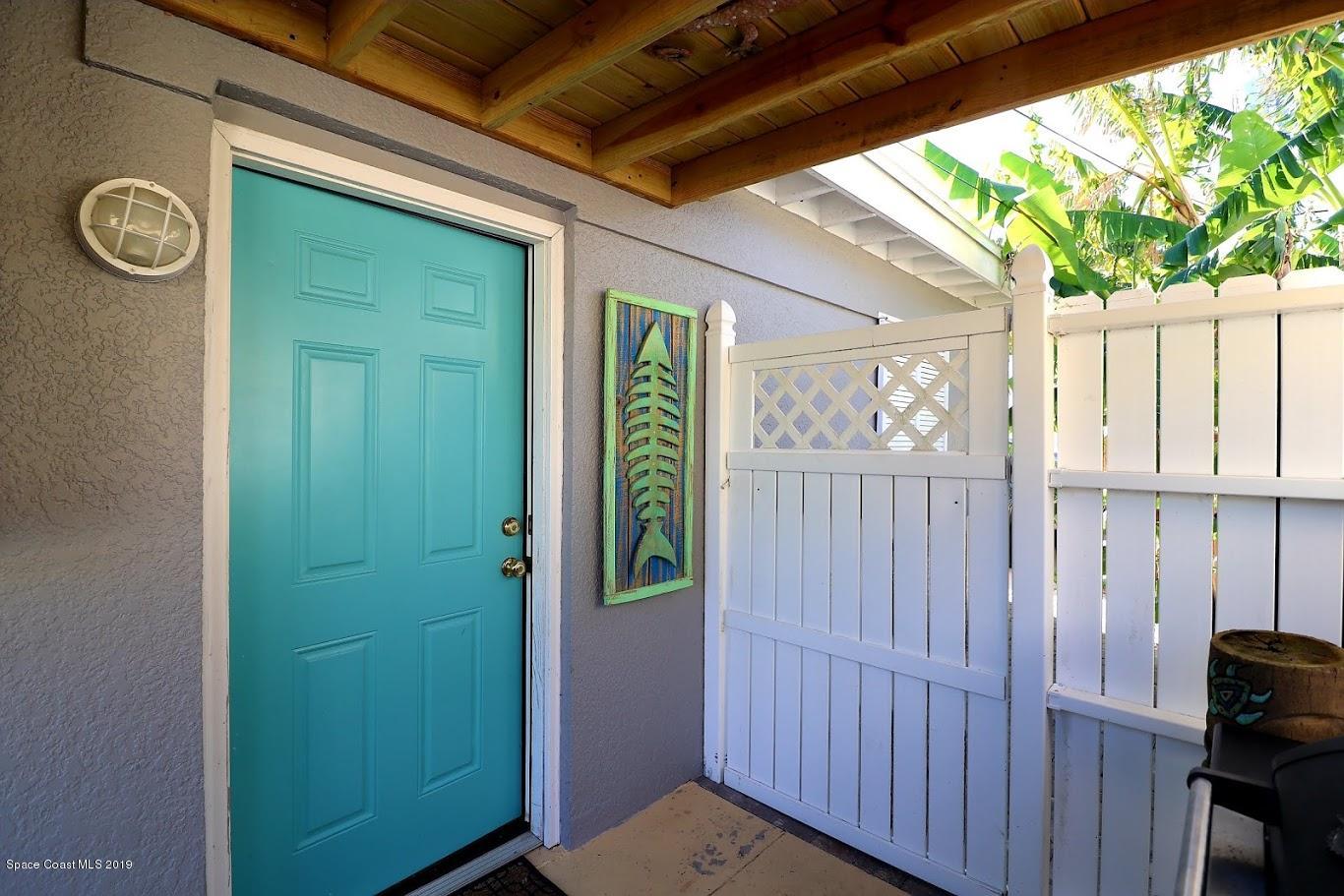 117 Chipola Road Cocoa Beach, FL 32931 - Photo 50 of 54 117 Chipola garage entry