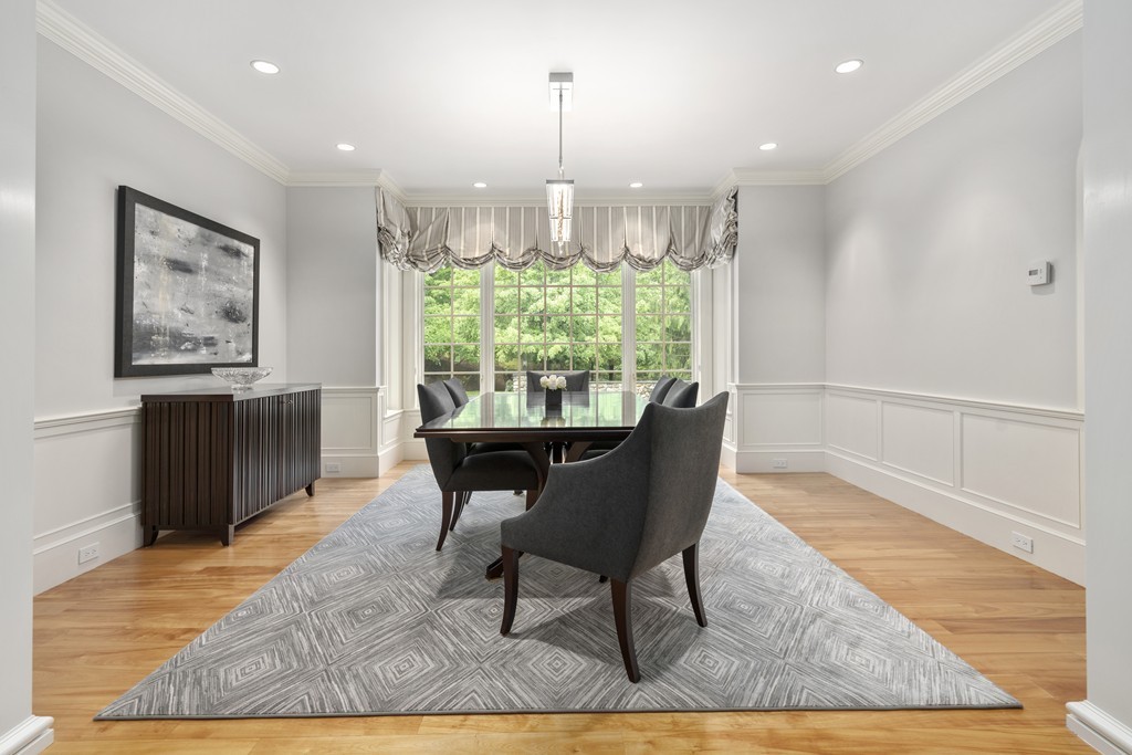 49 Possum Road Weston, MA 02493 - Photo 11 of 33 a view of a dining room with furniture window and wooden floor