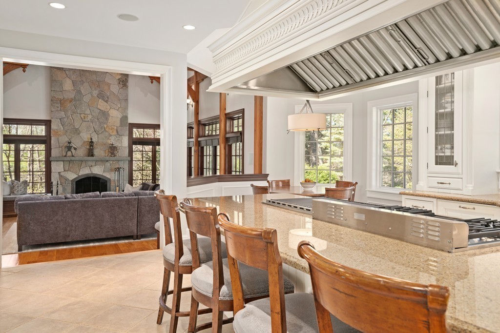 49 Possum Road Weston, MA 02493 - Photo 14 of 33 a living room with furniture and a fireplace