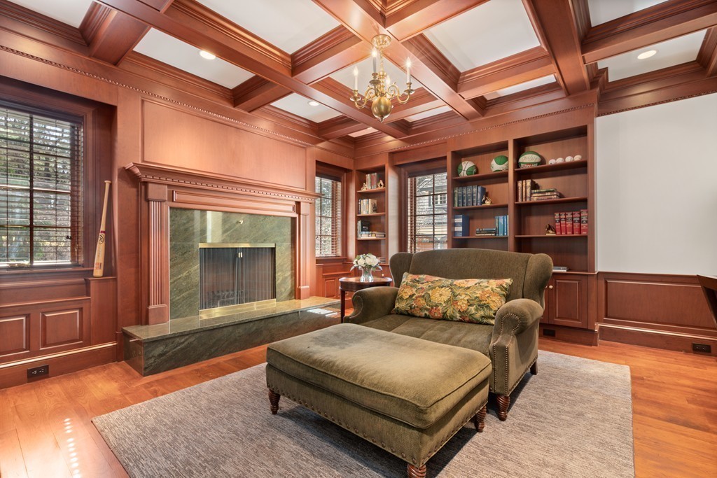 49 Possum Road Weston, MA 02493 - Photo 15 of 33 a bedroom with a bed couch and a fireplace