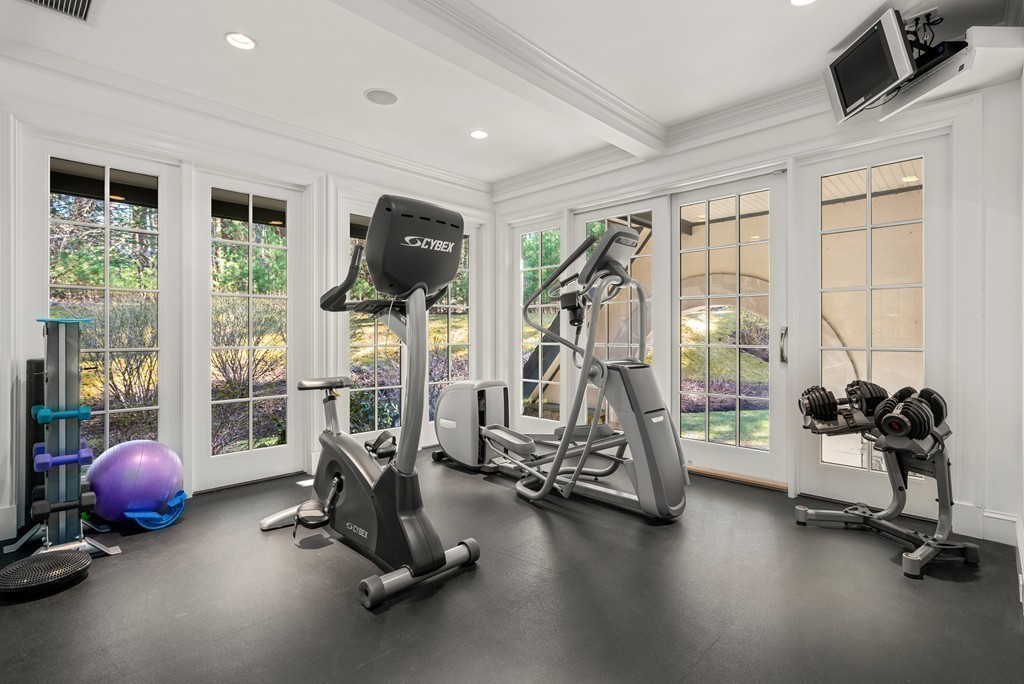 49 Possum Road Weston, MA 02493 - Photo 24 of 33 a view of a room with gym equipment