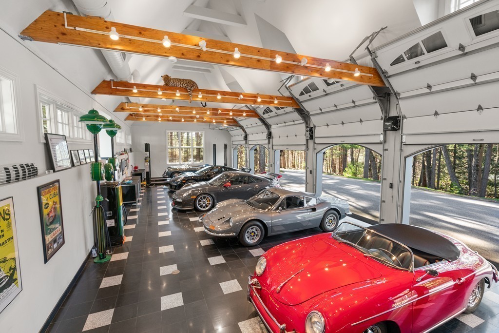 49 Possum Road Weston, MA 02493 - Photo 5 of 33 a view of a cars park in front of building