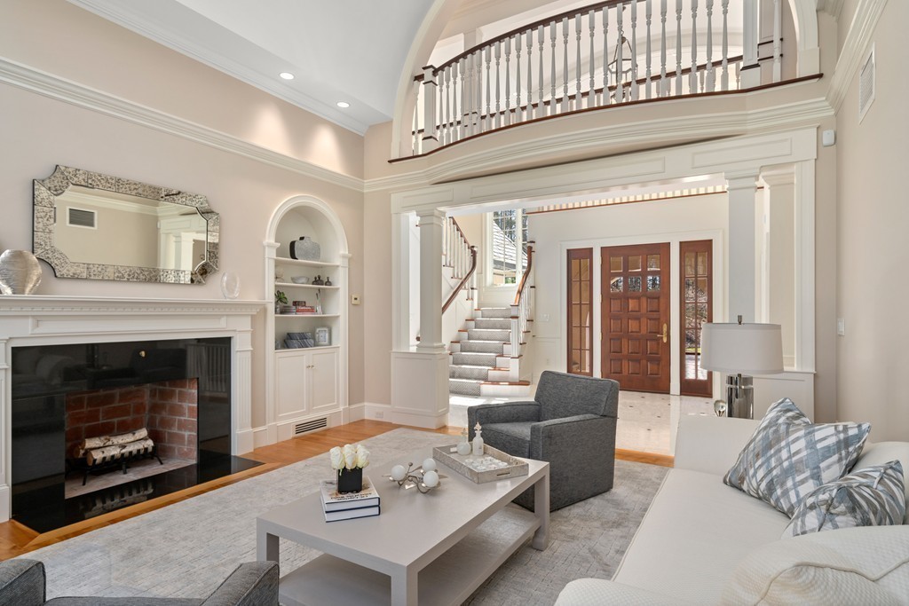 49 Possum Road Weston, MA 02493 - Photo 6 of 33 a living room with furniture and a fireplace