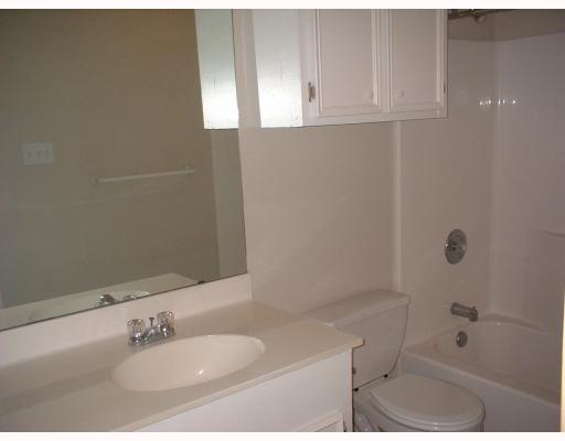 800 West Bayview Boulevard Portland, TX 78374 - Photo 8 of 10 a bathroom with a sink and a mirror