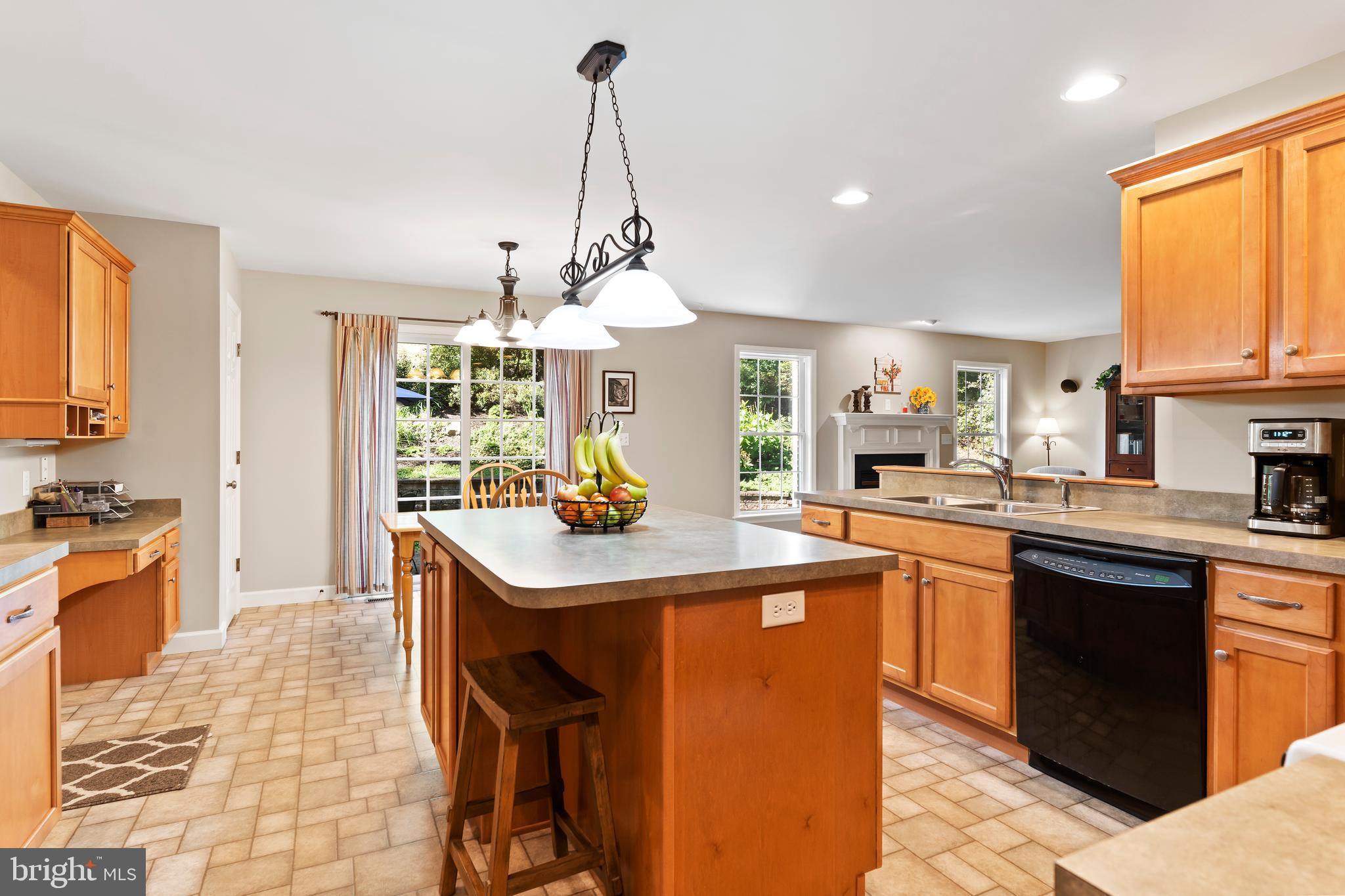 565 Nauvoo Road Lewisberry, PA 17339 - Photo 13 of 40 Large island with bar seating and ample workspace