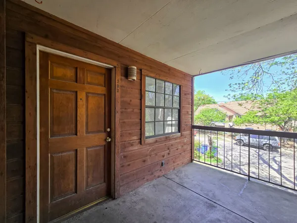 wooden floor in a room with a window