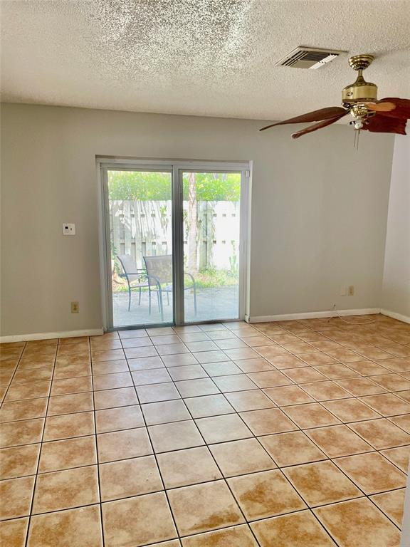 5871 Woodland Point Drive Tamarac, FL 33319 - Photo 5 of 10 a view of an empty room and window