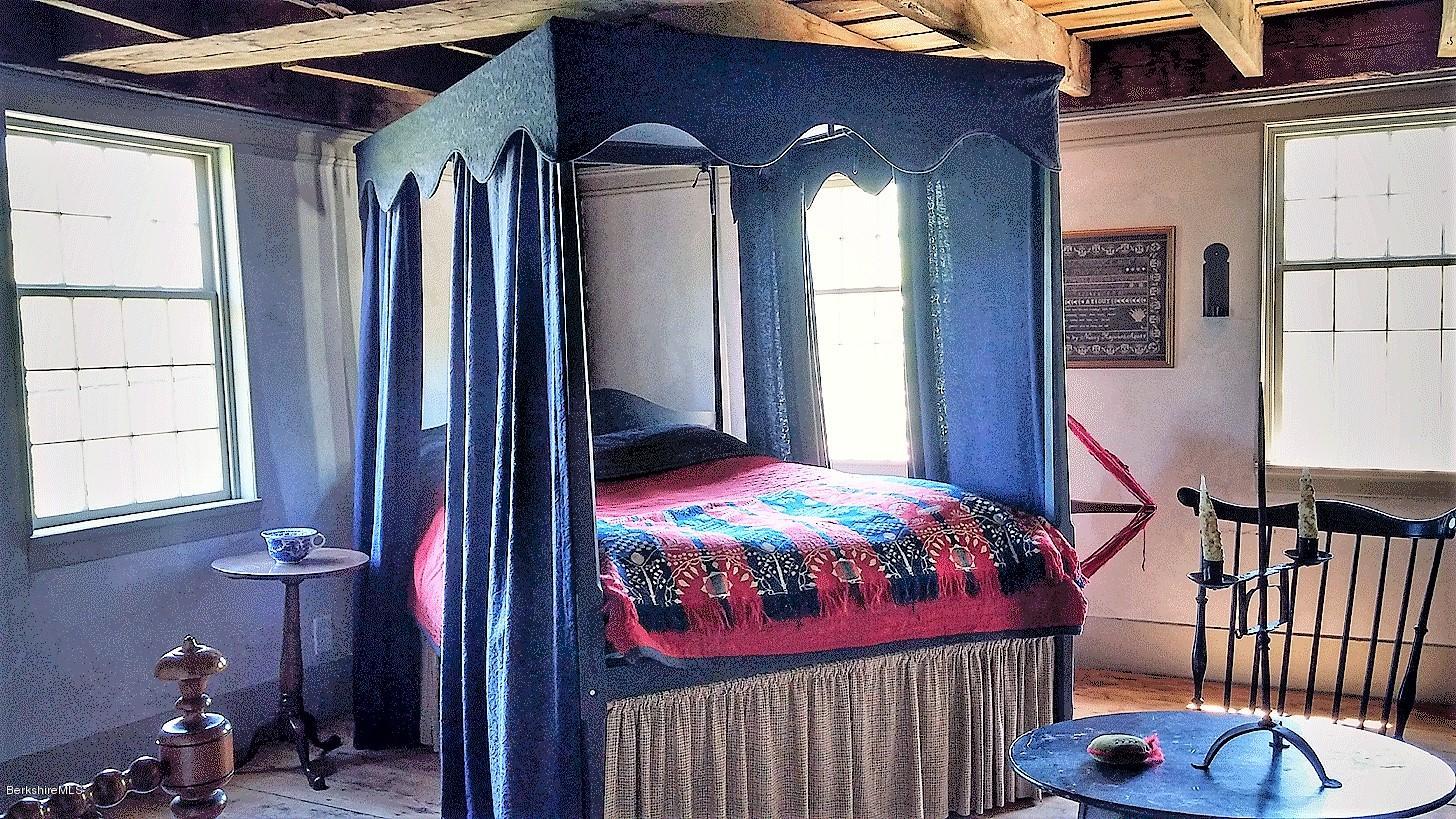 1600 Russell Road Montgomery, MA 01085 - Photo 20 of 36 a bedroom with a bed and a window