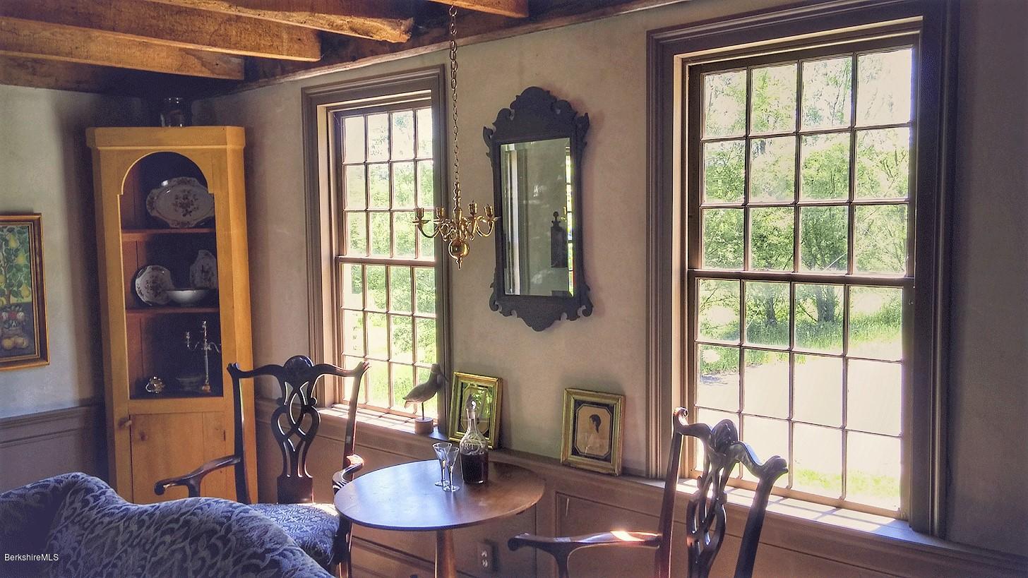 1600 Russell Road Montgomery, MA 01085 - Photo 31 of 36 a view of a dining room with furniture window and wooden floor