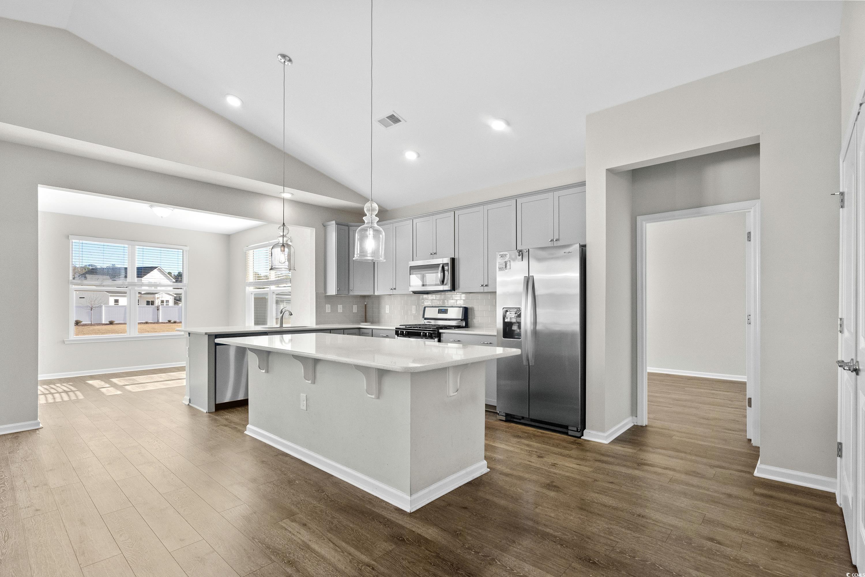 1378 TESSERA Way Myrtle Beach, SC 29579 - Photo 13 of 40 Kitchen with backsplash, stainless steel appliance