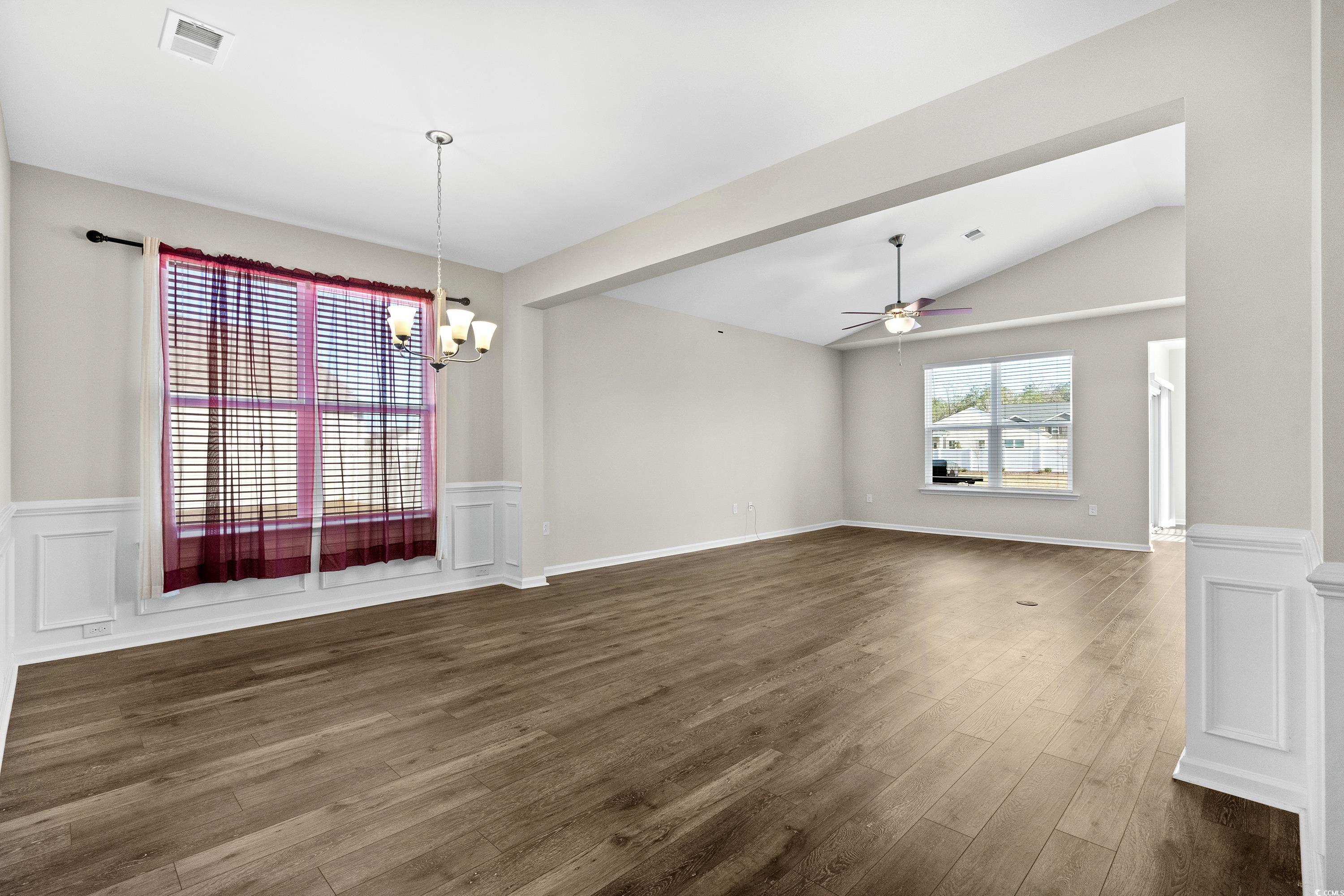 Interior space featuring dark hardwood / wood-styl