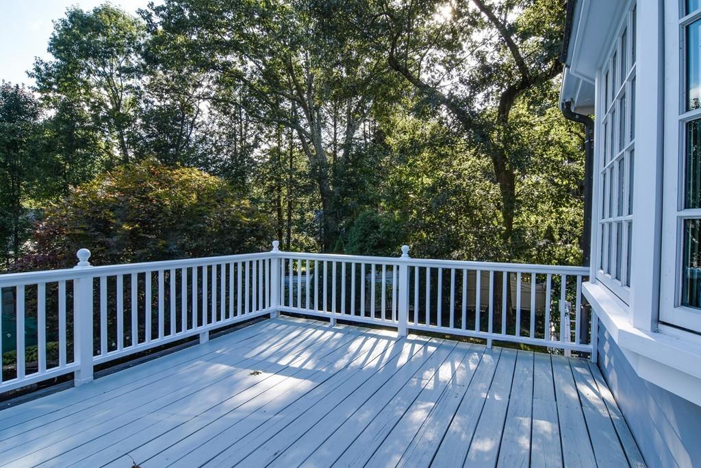 34 Lowell Road Wellesley, MA 02481 - Photo 12 of 14 a view of balcony with wooden floor