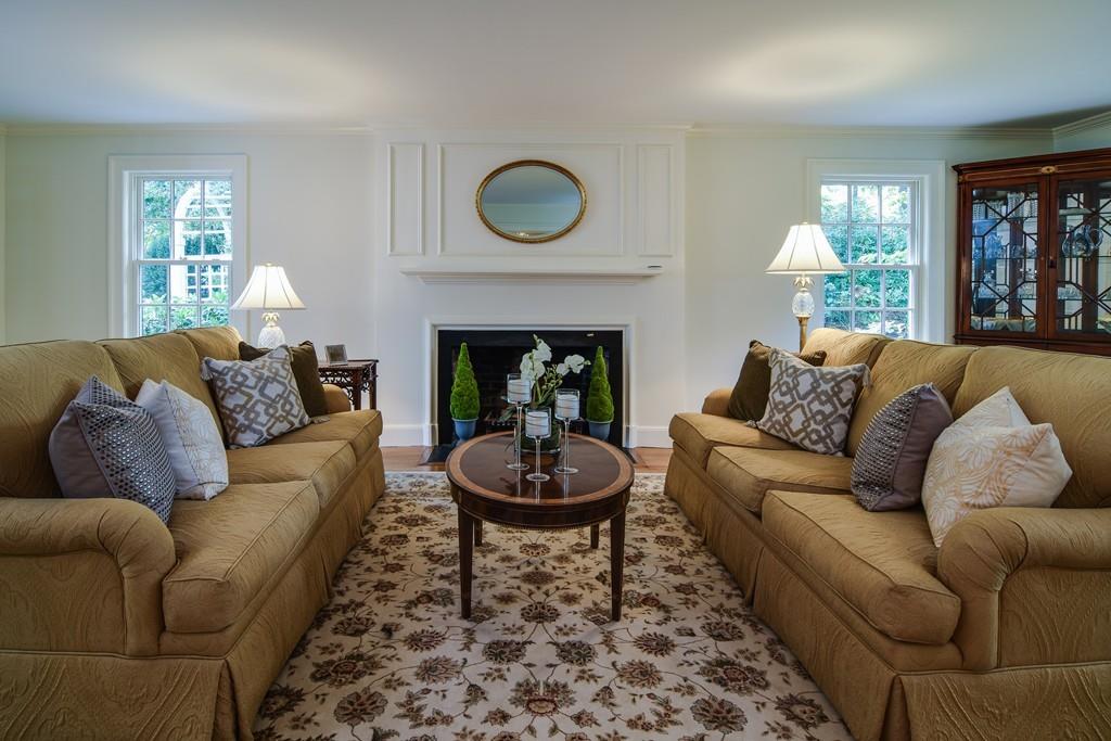 34 Lowell Road Wellesley, MA 02481 - Photo 4 of 14 a living room with furniture a window and a fireplace