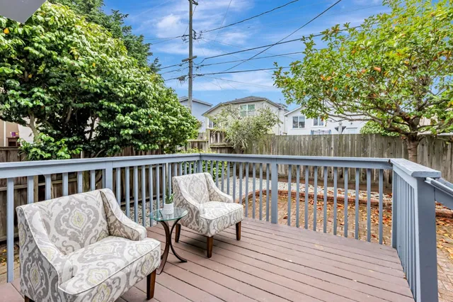 a view of a chair on wooden deck