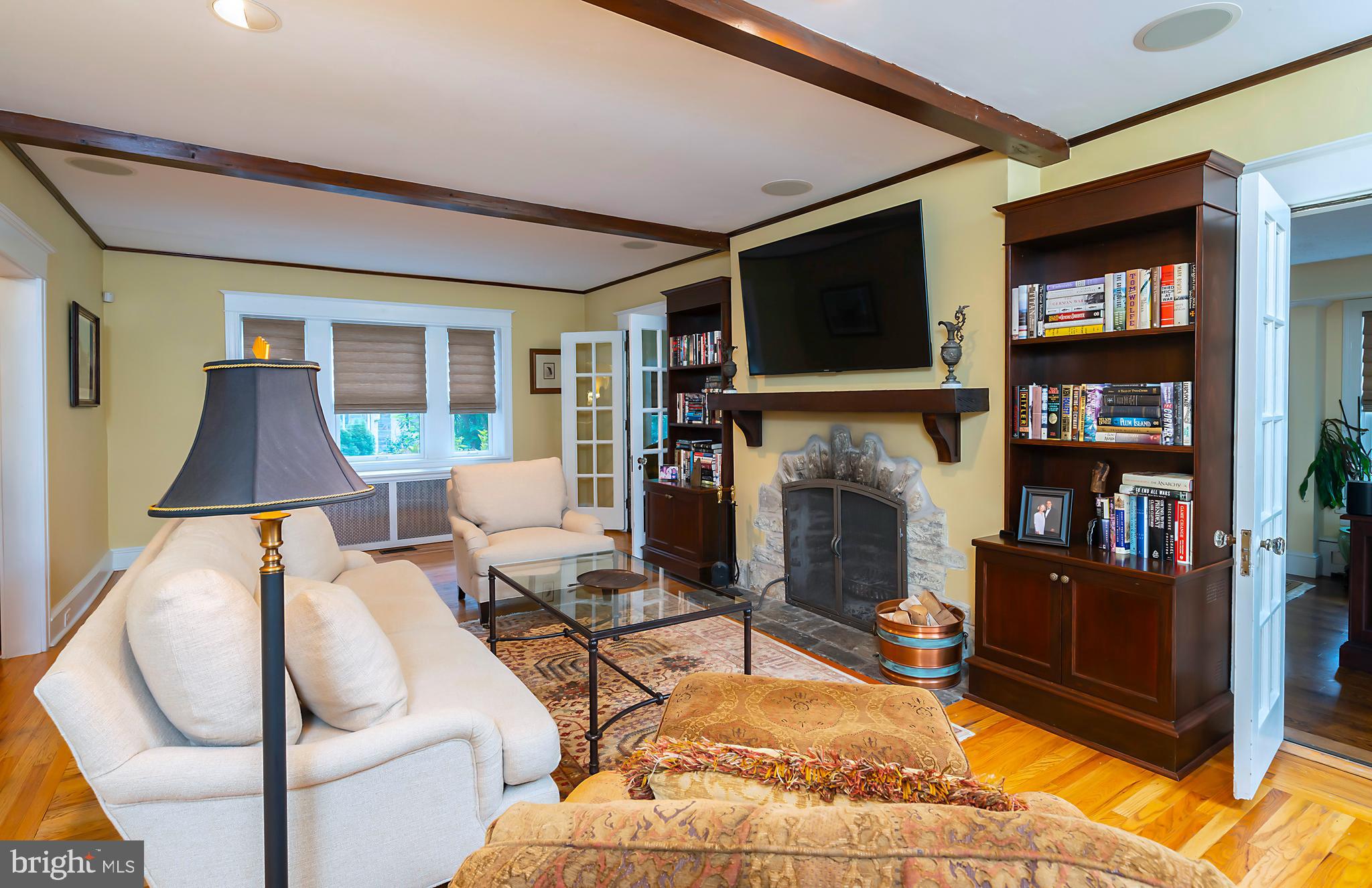 327 Valley Road Merion Station, PA 19066 - Photo 11 of 55 Family room is adjacent to sunroom