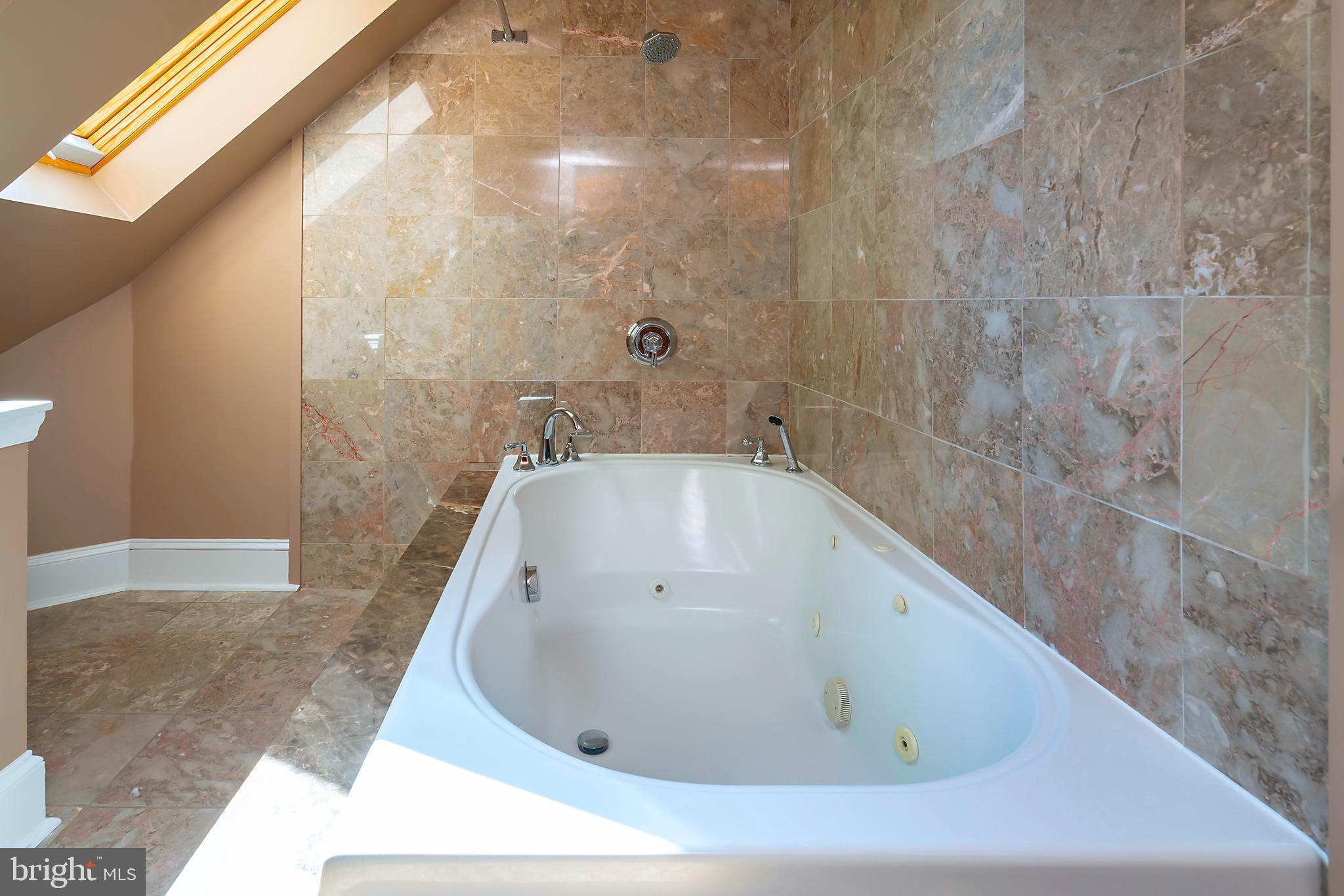 327 Valley Road Merion Station, PA 19066 - Photo 46 of 55 Gorgeous third floor bathroom with skylights