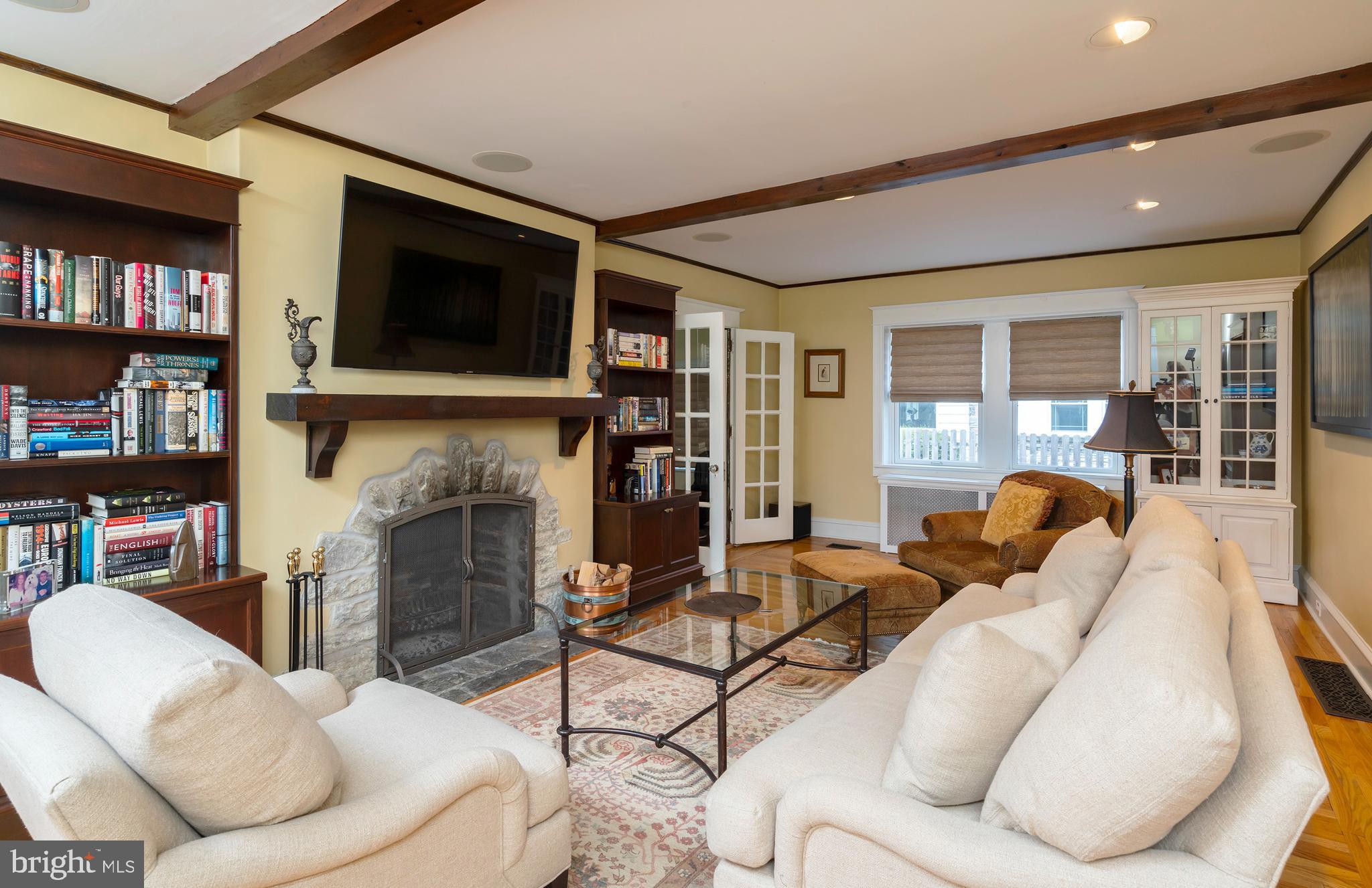 327 Valley Road Merion Station, PA 19066 - Photo 10 of 55 Family room with gorgeous fireplace & built-ins