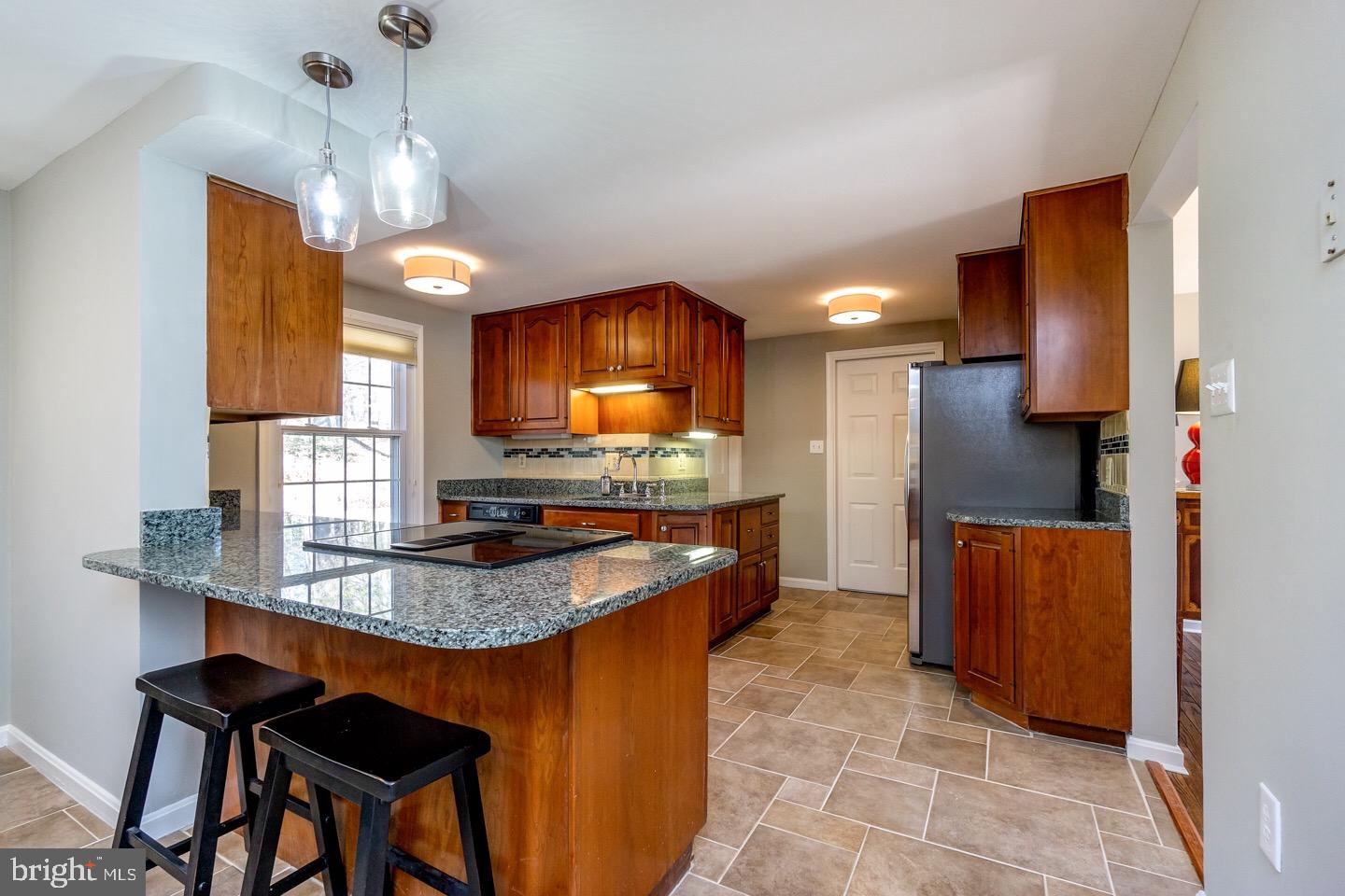 11416 Running Cedar Road Reston, VA 20191 - Photo 15 of 43 UPDATED KITCHEN INCLUDES GRANITE AND STAINLESS APP