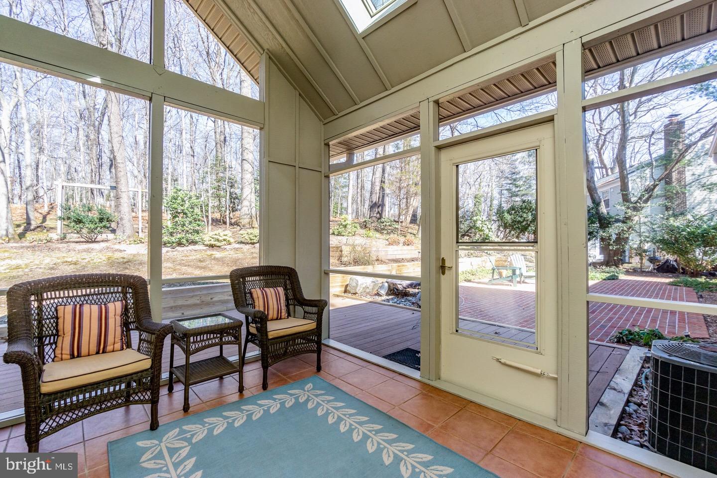 11416 Running Cedar Road Reston, VA 20191 - Photo 23 of 43 SCREENED PORCH WITH CATHEDRAL CEILING +SKYLIGHTS