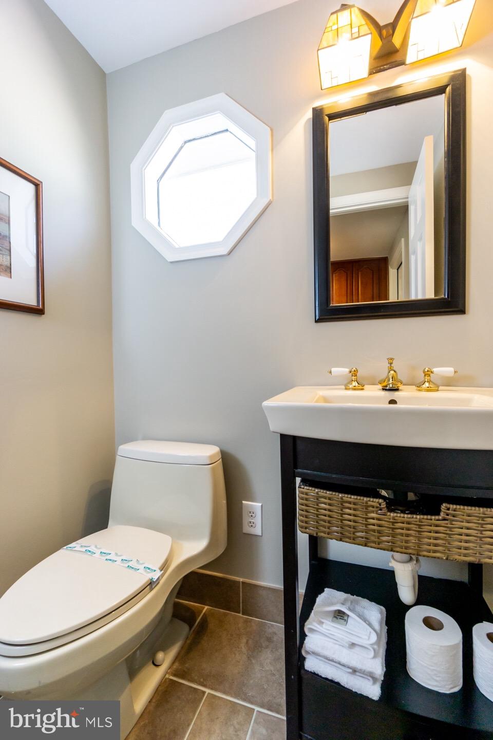 11416 Running Cedar Road Reston, VA 20191 - Photo 27 of 43 POWDER ROOM CONVIENTLY LOCATED ON MAIN LEVEL
