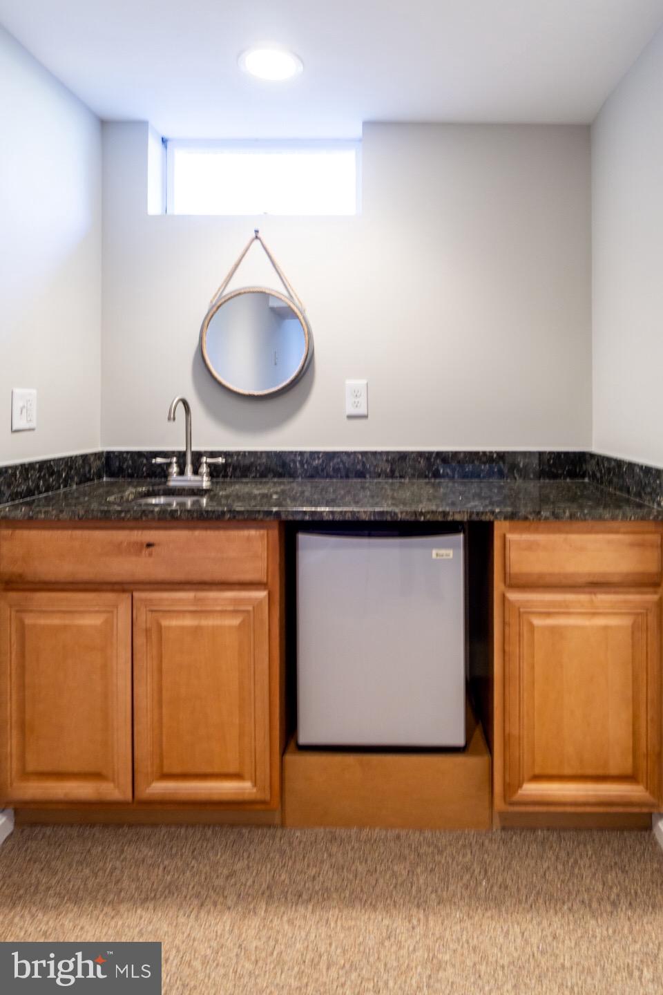 11416 Running Cedar Road Reston, VA 20191 - Photo 38 of 43 WET BAR IN REC RM