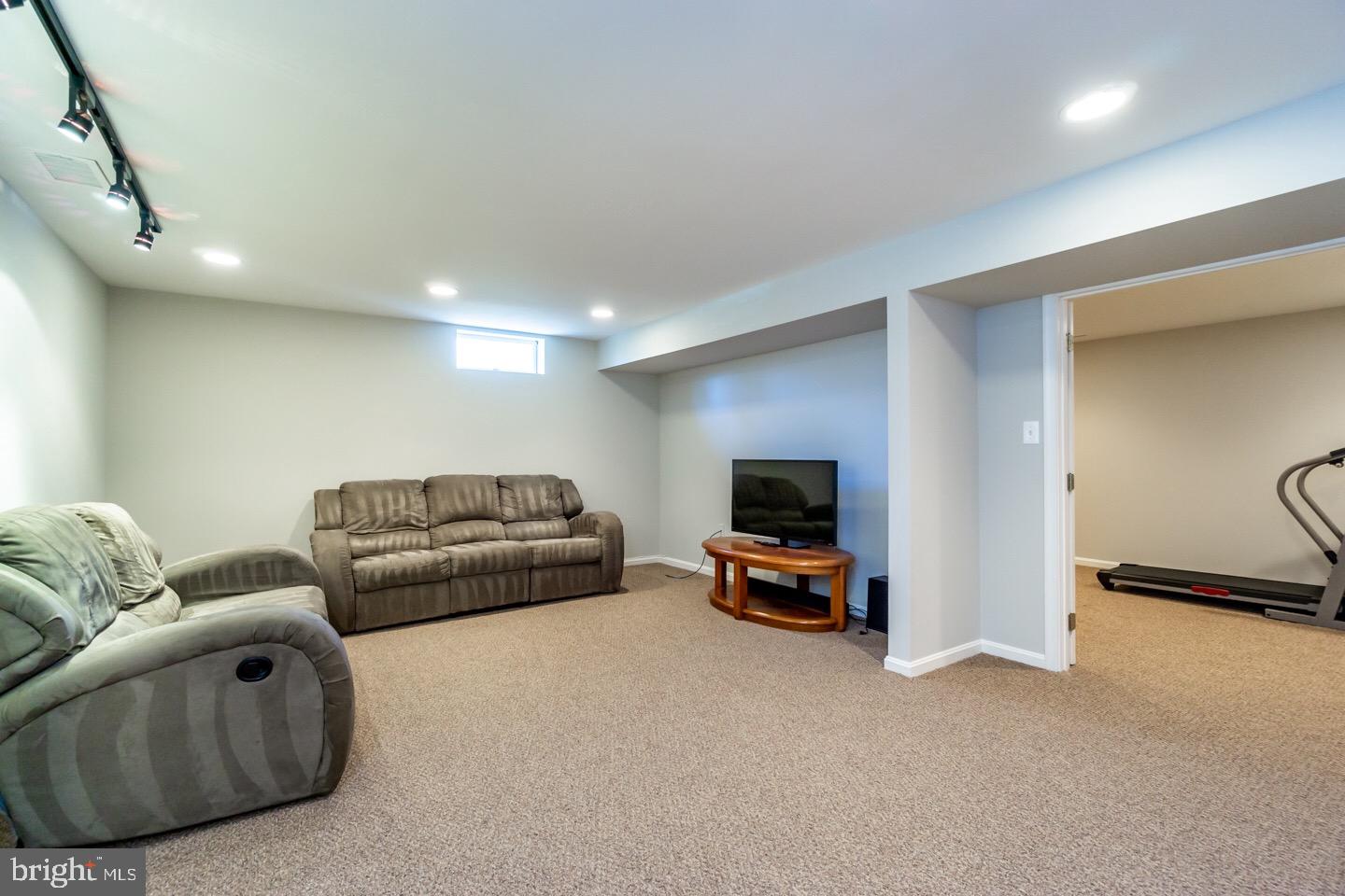11416 Running Cedar Road Reston, VA 20191 - Photo 39 of 43 FININISHED BASEMENT W/ MEDIA AREA AND EXERCISE RM