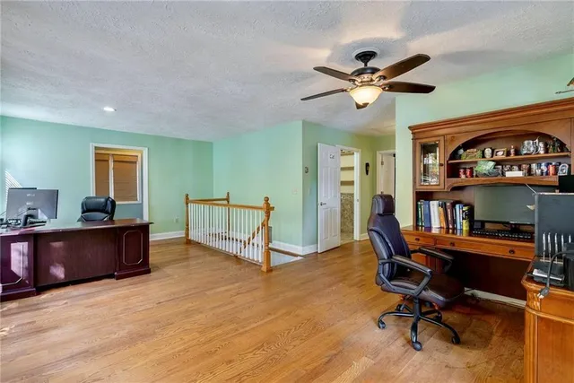 a view of a workspace with furniture