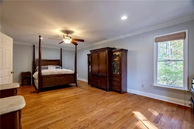 a bedroom with a bed and a closet