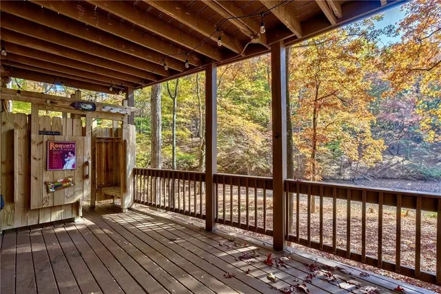a view of porch with wooden floor