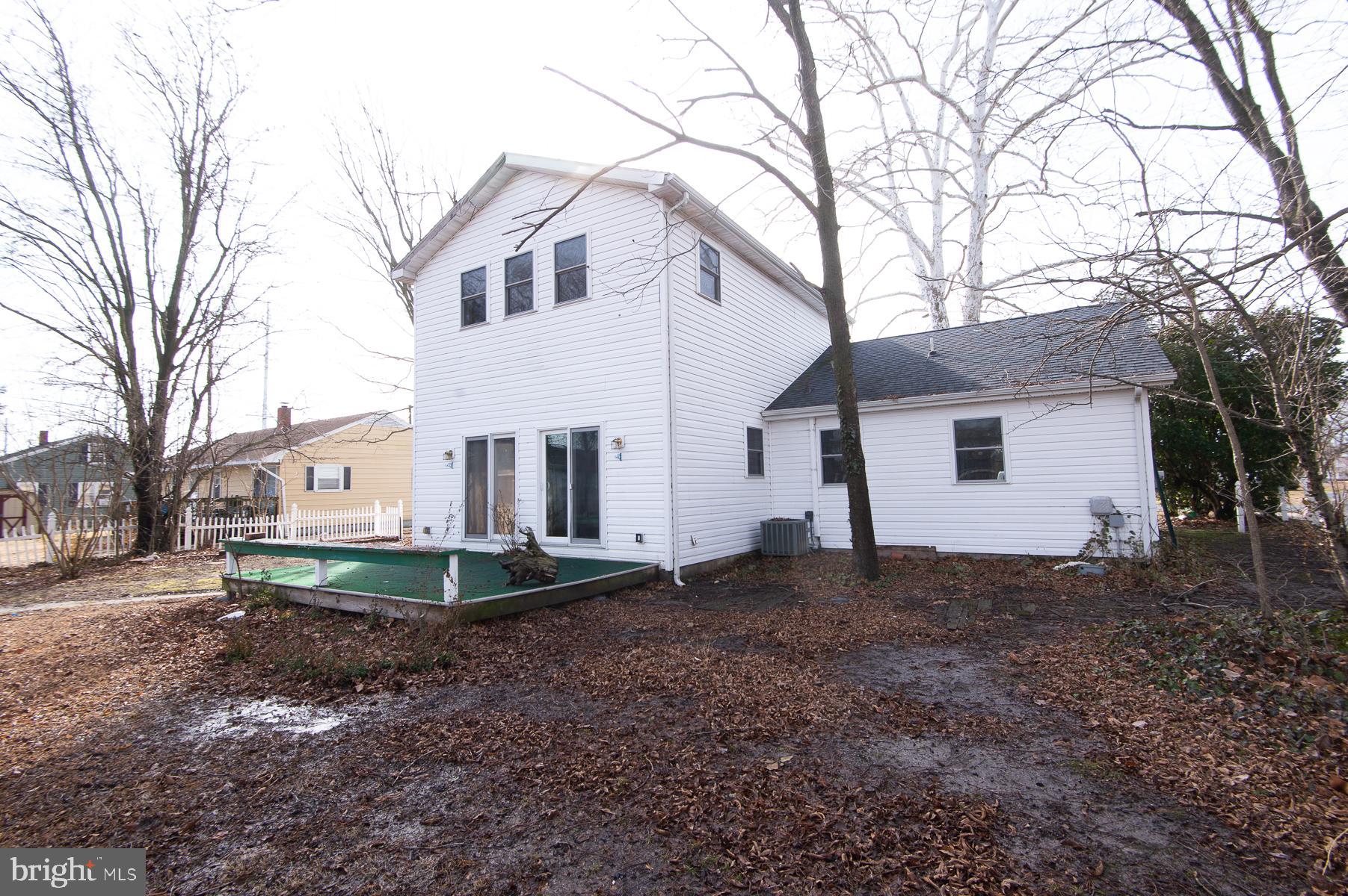 1210 Stone Boundary Road Cambridge, MD 21613 - Photo 2 of 63 a view of a house with a yard